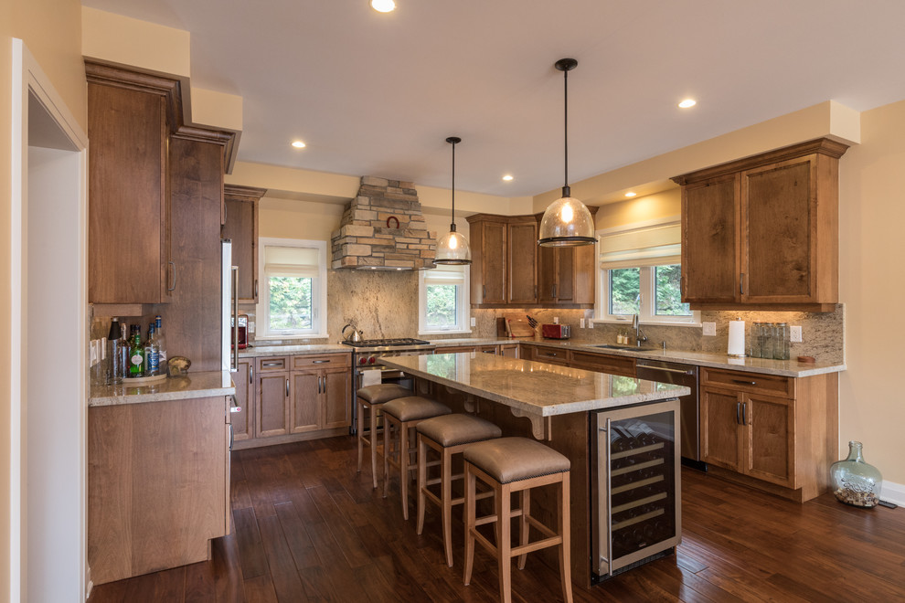 Eat-in kitchen - large transitional u-shaped dark wood floor and brown floor eat-in kitchen idea in Toronto with an undermount sink, recessed-panel cabinets, dark wood cabinets, granite countertops, multicolored backsplash, stone slab backsplash, stainless steel appliances, an island and brown countertops