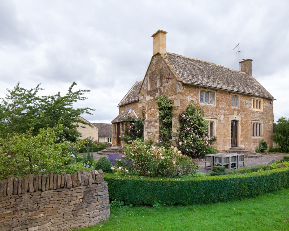 Design ideas for a farmhouse two floor house exterior in Gloucestershire with a pitched roof.