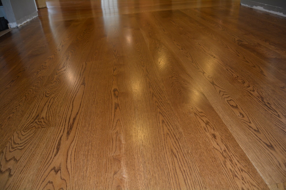 8" White oak wood floors refinished with English Chesnut stain