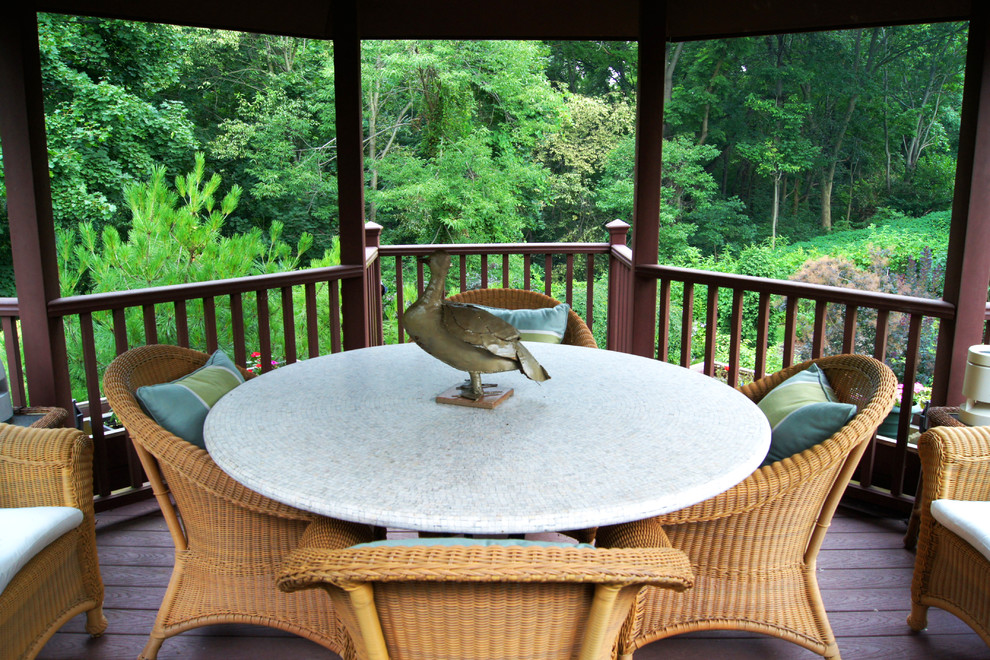 Large mountain style backyard deck photo