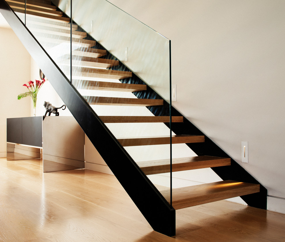Small contemporary wood straight staircase in Sydney with open risers.