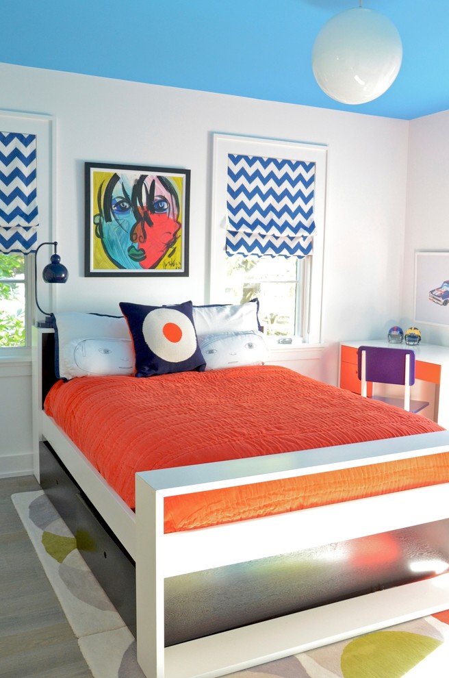 Design ideas for a contemporary kids' room in New York with white walls.