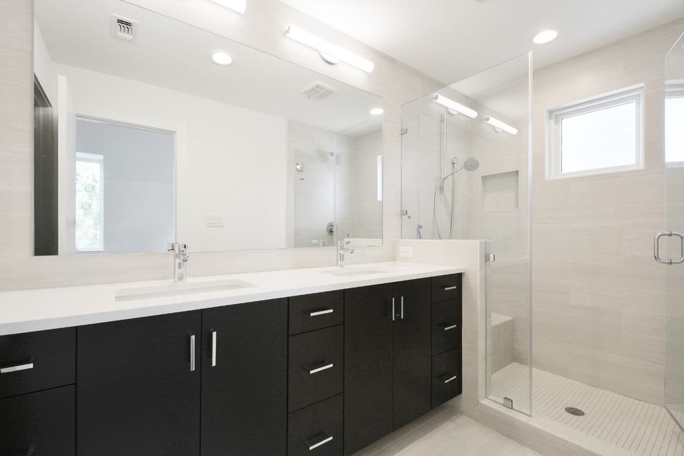 Design ideas for a mid-sized modern master bathroom in Austin with an undermount sink, flat-panel cabinets, black cabinets, engineered quartz benchtops, an alcove shower, white tile, ceramic tile, white walls and ceramic floors.