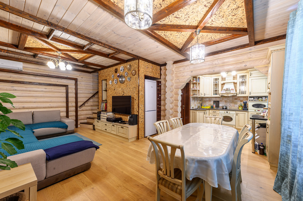 отделка дома из оцилиндрованного бревна