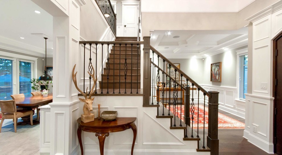 Mid-sized beach style wood l-shaped staircase in New York with wood risers and mixed railing.