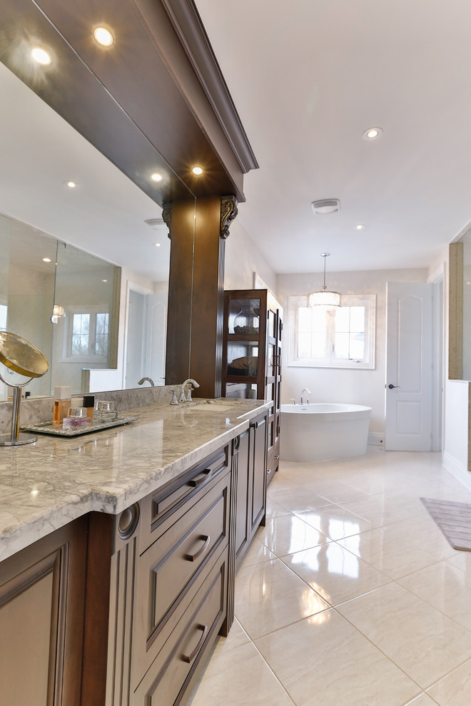 Example of a transitional kitchen design in Toronto