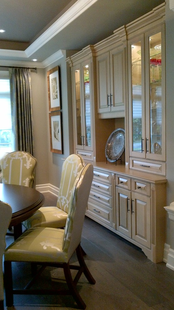 Large transitional medium tone wood floor home design photo in Toronto with gray walls