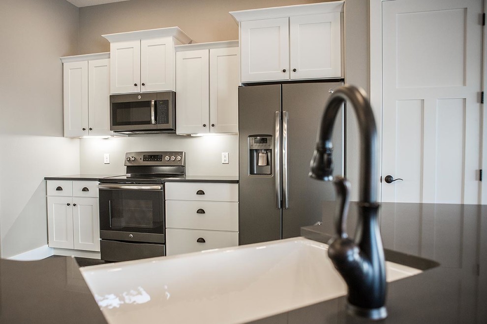 Transitional kitchen photo in Cedar Rapids