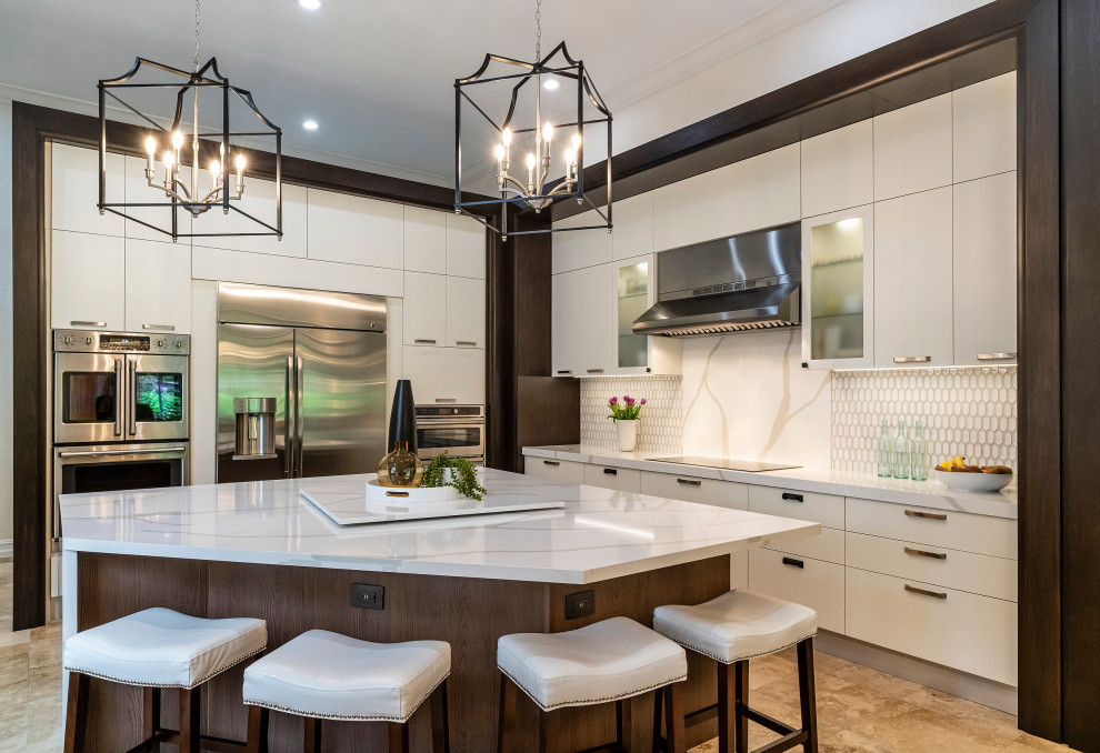 Design ideas for an expansive contemporary u-shaped open plan kitchen in Miami with flat-panel cabinets, dark wood cabinets, quartzite benchtops, white splashback, engineered quartz splashback, stainless steel appliances, travertine floors, with island, beige floor and white benchtop.