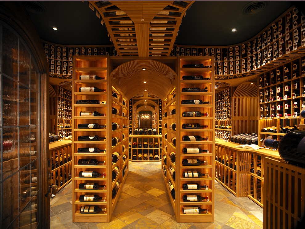 Inspiration for an expansive country wine cellar in Boise with slate floors and storage racks.