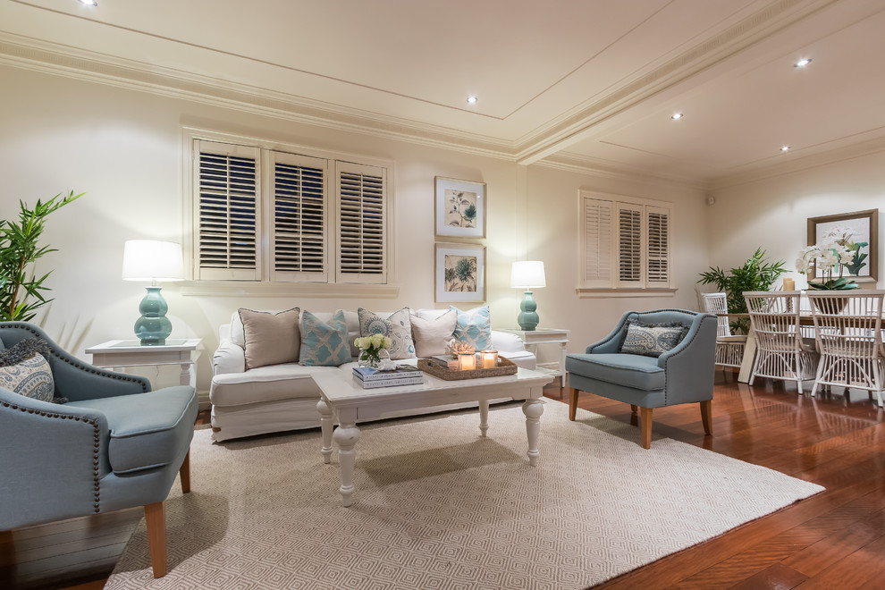 Design ideas for a beach style formal open concept living room in Brisbane with beige walls, medium hardwood floors and brown floor.