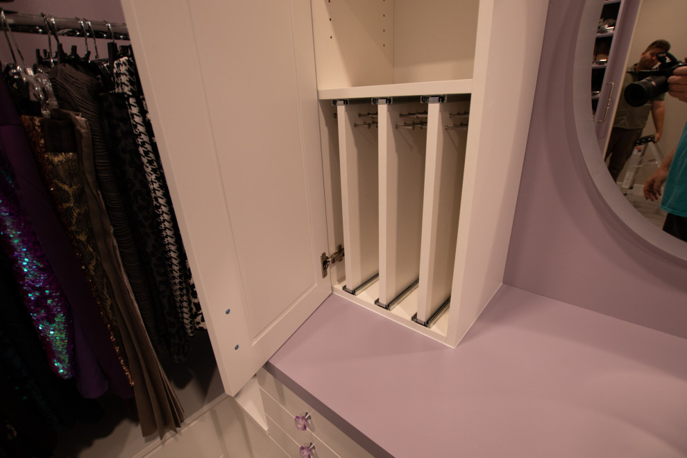 Large traditional walk-in wardrobe for women in Salt Lake City with flat-panel cabinets, white cabinets, carpet, purple floors and a coffered ceiling.