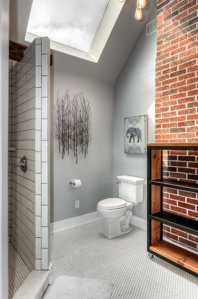 Design ideas for a large transitional master bathroom in Omaha with open cabinets, medium wood cabinets, an open shower, a one-piece toilet, white tile, subway tile, grey walls, mosaic tile floors, an undermount sink and marble benchtops.