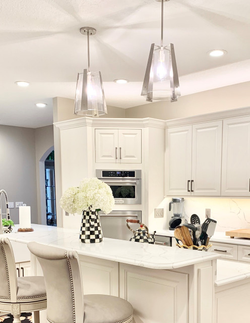 Ivory White Kitchen With Marble Look Quartz Counters and Splash traditional-kitchen