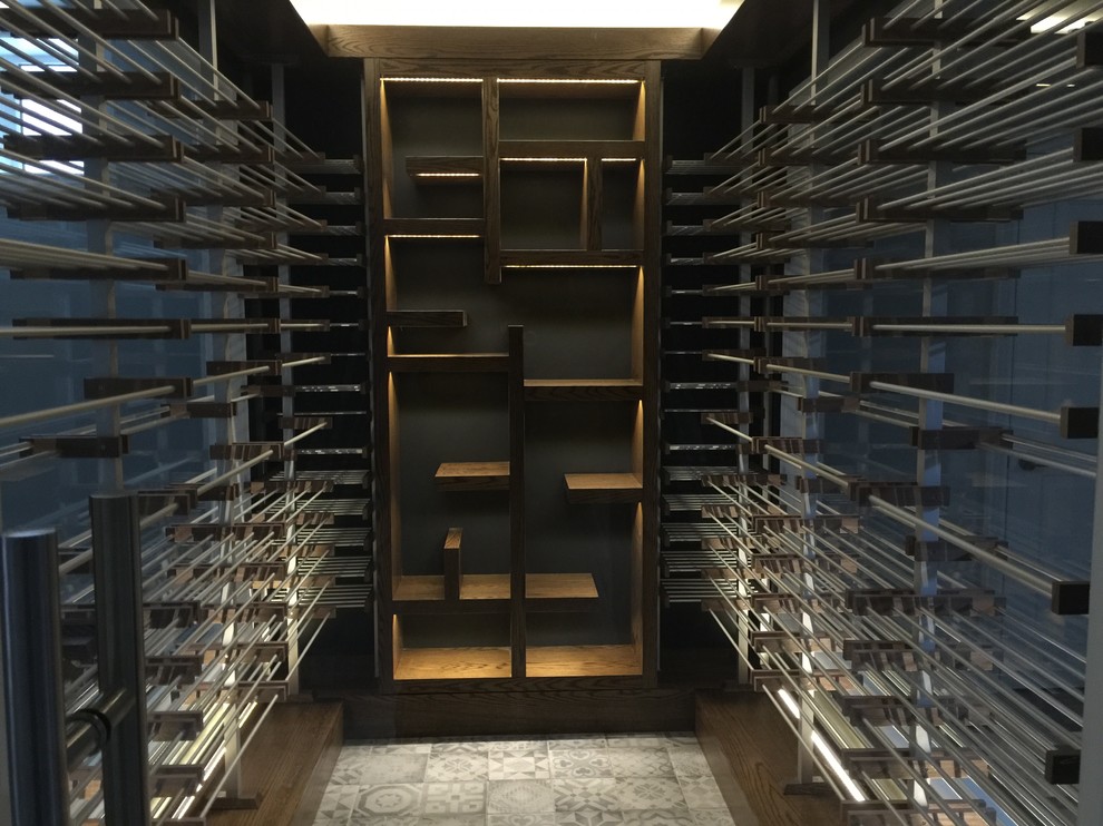 Inspiration for a mid-sized contemporary wine cellar in Toronto with storage racks, ceramic floors and white floor.