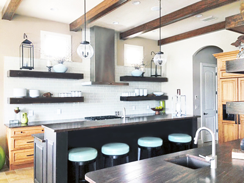 Inspiration for a mid-sized modern galley separate kitchen in Salt Lake City with a single-bowl sink, raised-panel cabinets, light wood cabinets, granite benchtops, grey splashback, ceramic splashback, stainless steel appliances, porcelain floors, with island, beige floor and black benchtop.