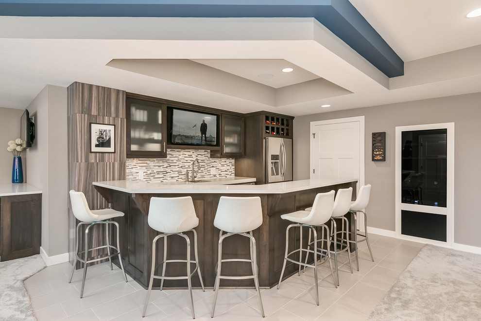Inspiration for a large contemporary home bar in Minneapolis with carpet and grey floor.