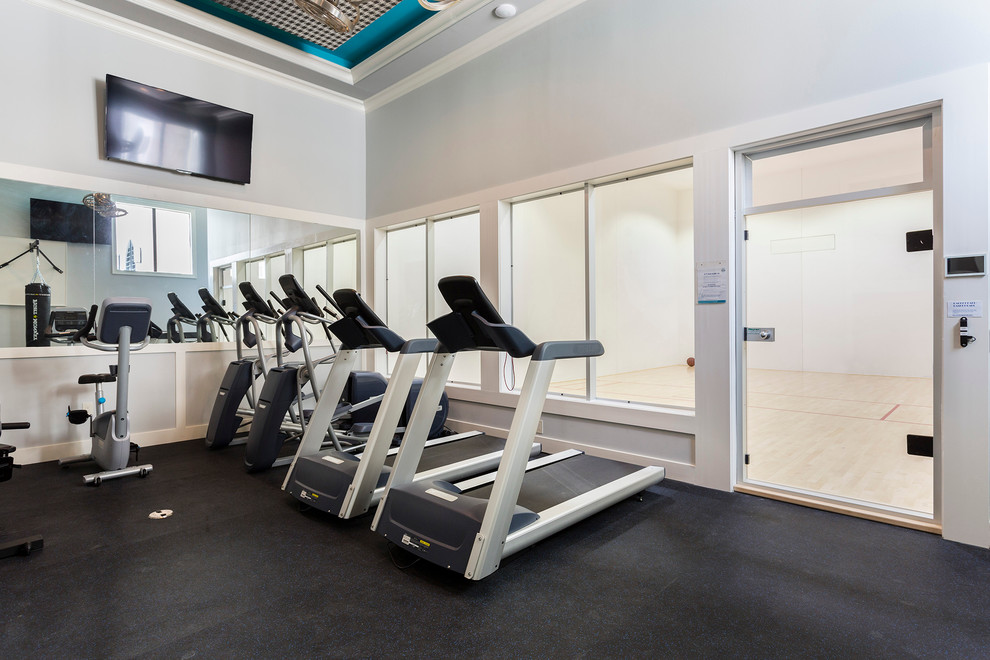 This is an example of a large transitional multipurpose gym in Orlando with grey walls.