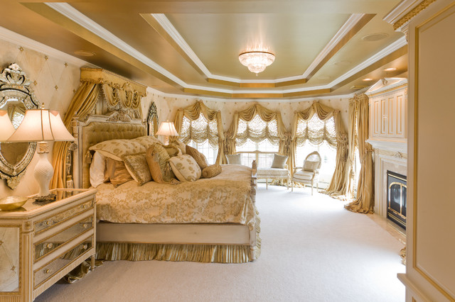 gold bedroom with custom bedding and window treatments - traditional