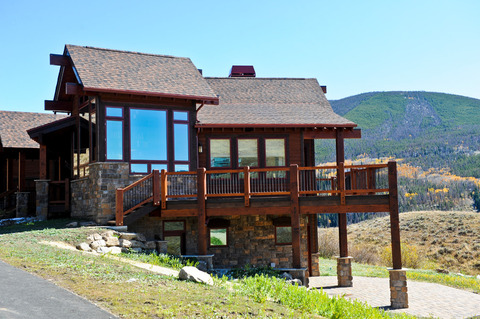 Traditional exterior in Denver with stone veneer.