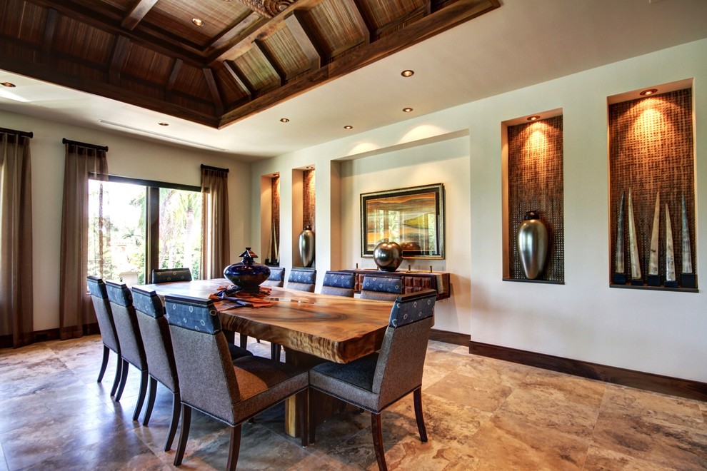 Expansive tropical dining room in Miami with beige walls.