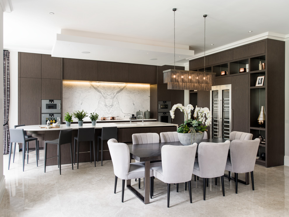 Inspiration for a large contemporary kitchen in Surrey with flat-panel cabinets, dark wood cabinets, with island and white benchtop.