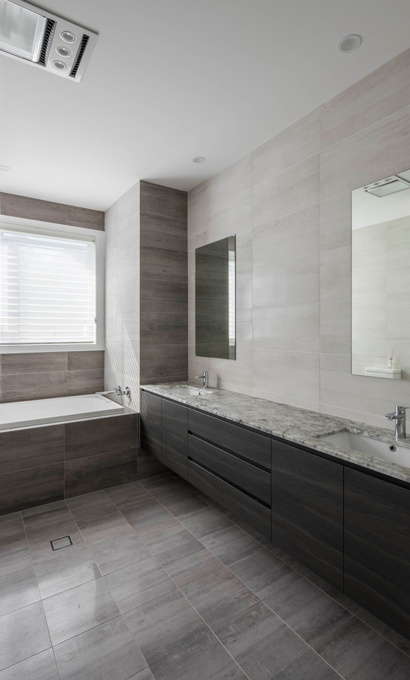 This is an example of a mid-sized contemporary bathroom in Sydney with flat-panel cabinets, brown cabinets, a double shower, brown tile, ceramic tile, brown walls, ceramic floors, an undermount sink, granite benchtops, brown floor, an open shower and grey benchtops.