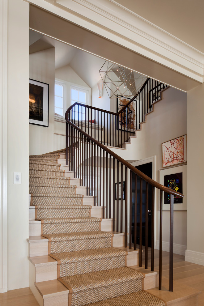 Design ideas for a transitional wood u-shaped staircase in Jacksonville with wood risers.