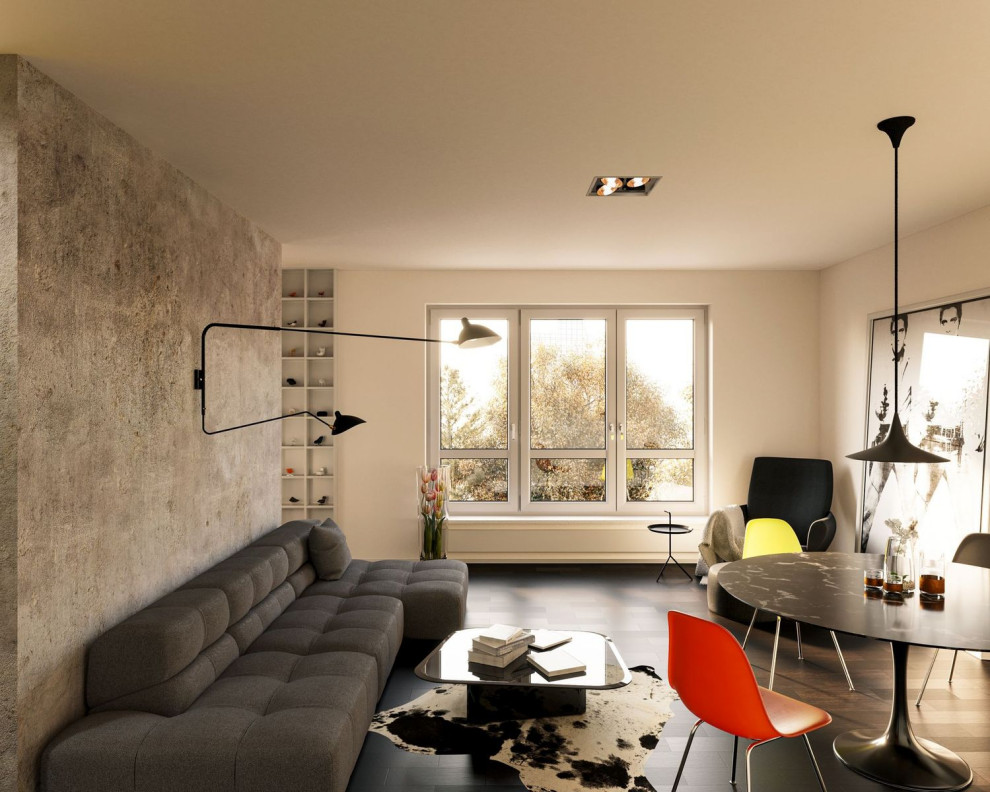Immagine di un soggiorno minimalista di medie dimensioni e aperto con libreria, pareti grigie, parquet scuro, nessuna TV e pavimento marrone