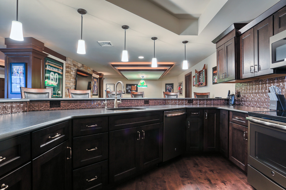 Photo of an expansive traditional kitchen in Other with carpet.