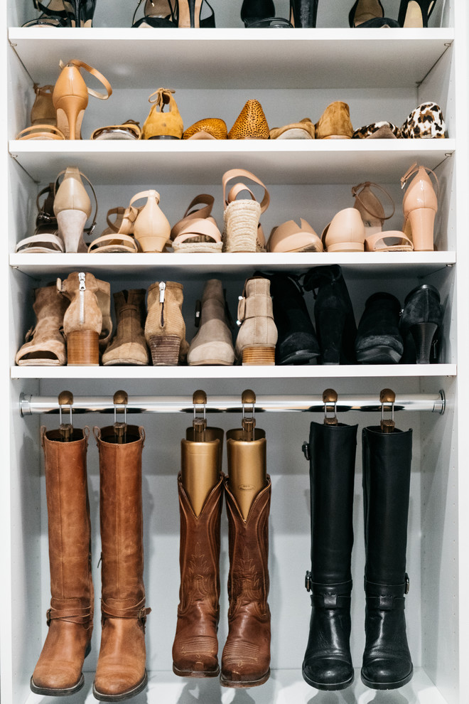 Inspiration for a mid-sized transitional gender-neutral walk-in wardrobe in San Francisco with shaker cabinets, white cabinets, medium hardwood floors, brown floor and wallpaper.