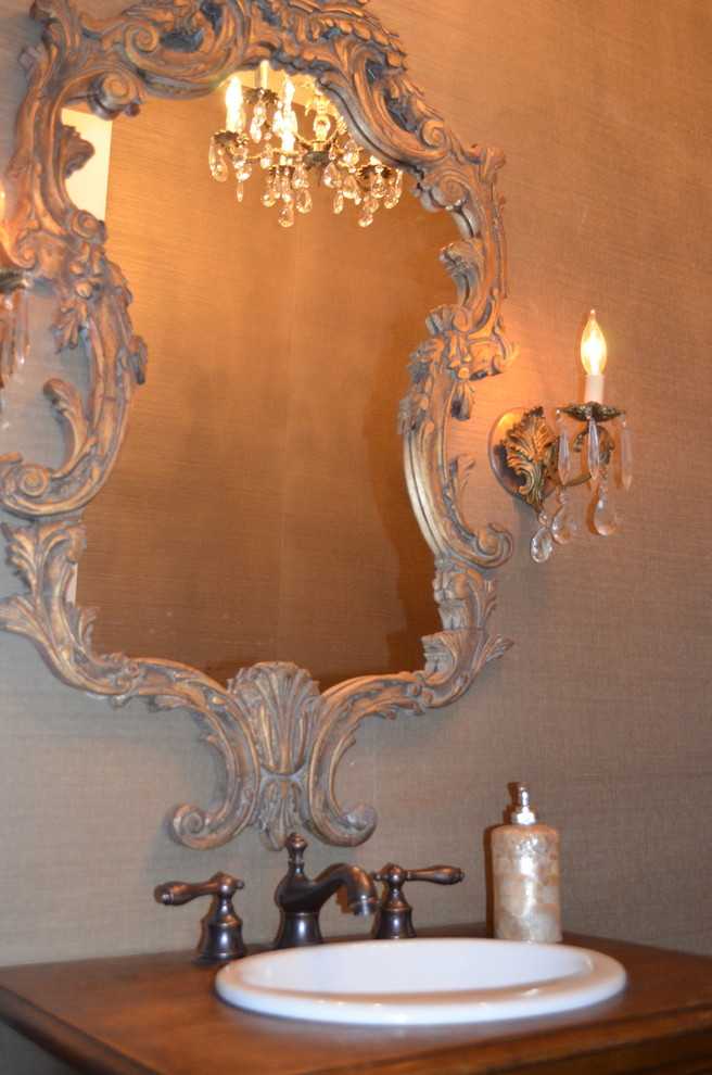 This is an example of a traditional powder room in Atlanta.