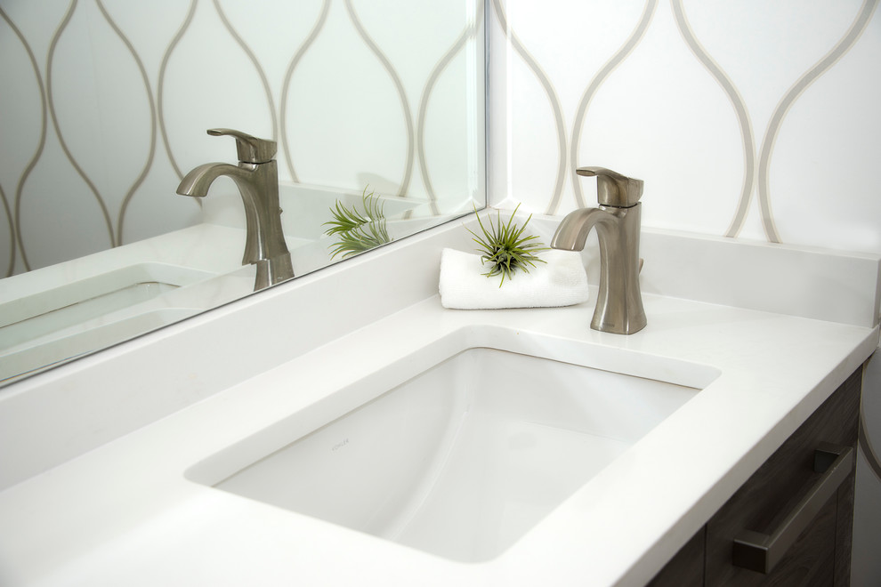 Example of a mid-sized transitional 3/4 white tile bathroom design in Chicago with flat-panel cabinets, brown cabinets, a one-piece toilet, white walls and an integrated sink