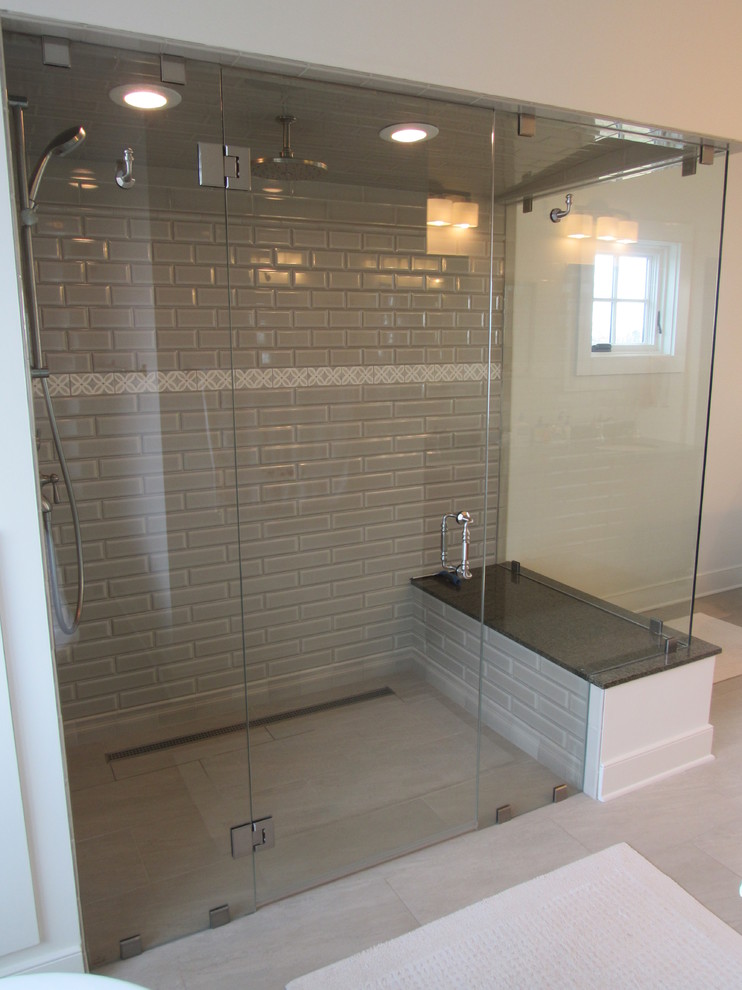 Inspiration for a large country master bathroom in Other with an integrated sink, shaker cabinets, white cabinets, granite benchtops, a curbless shower, a two-piece toilet, gray tile, white walls and ceramic floors.