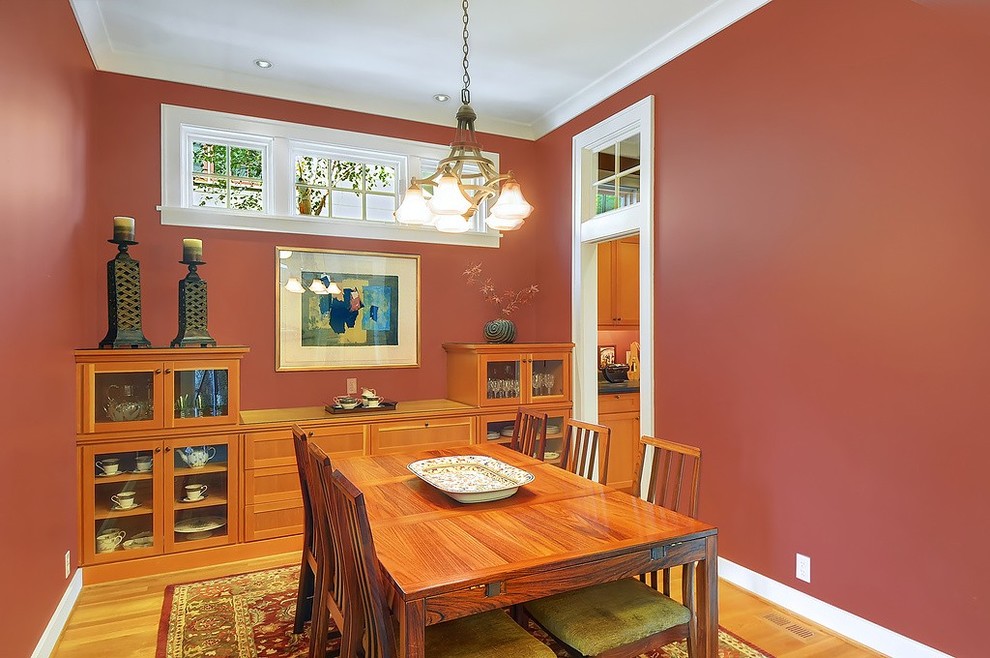 Photo of an arts and crafts dining room in Seattle.