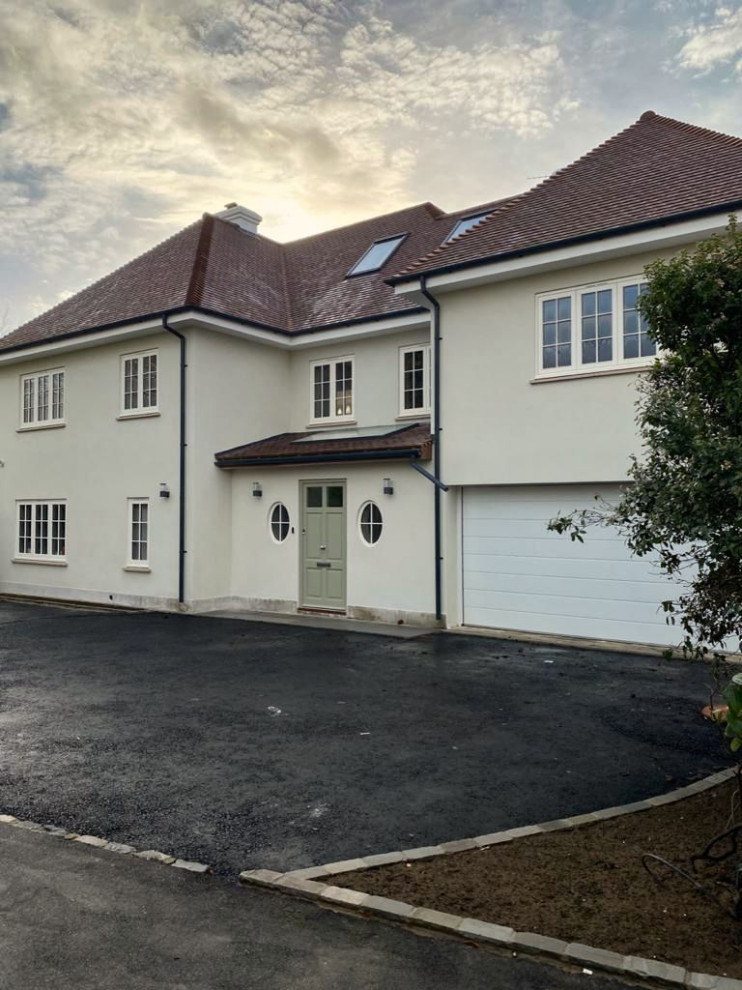 Double storey side and single rear extensions, full roof reconfiguration