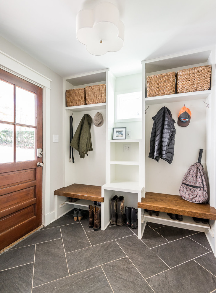 Inspiration for a transitional mudroom in Richmond with grey walls, porcelain floors, a single front door, a medium wood front door and grey floor.
