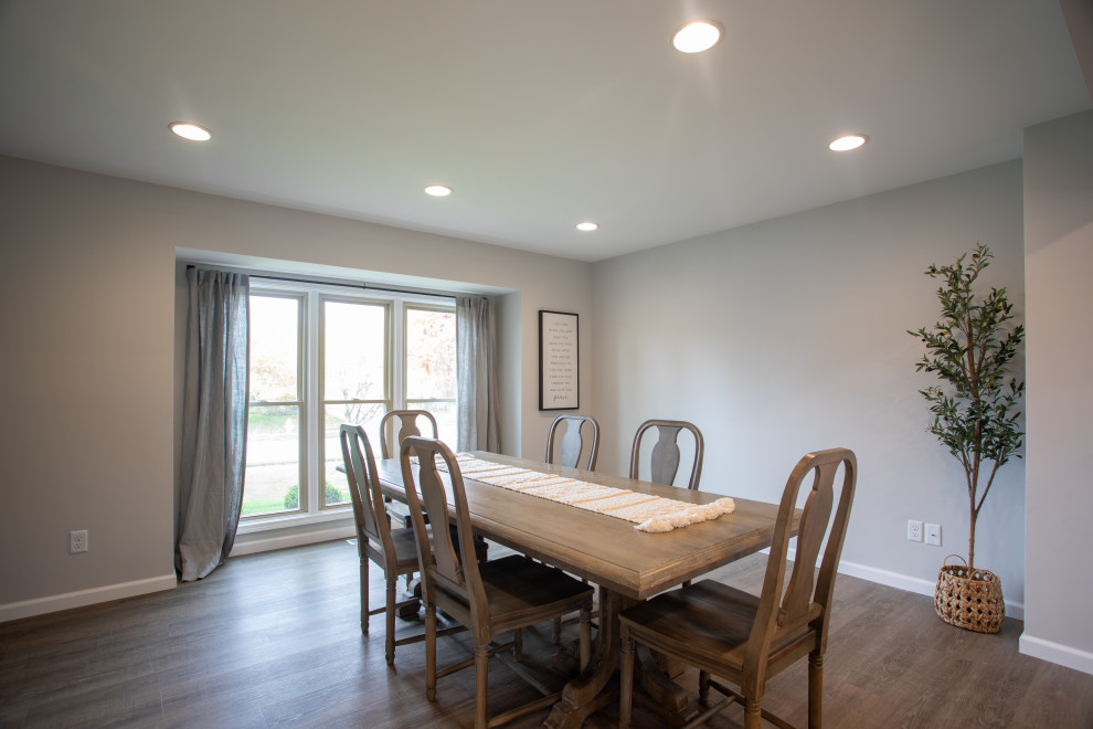 Large transitional vinyl floor kitchen/dining room combo photo