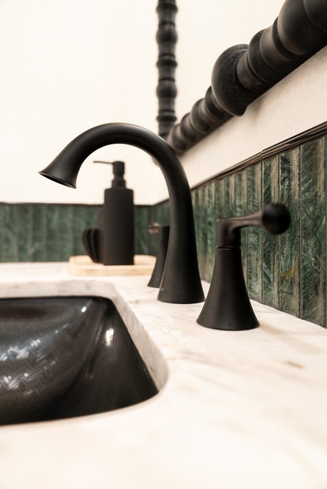 Mid-sized transitional master green tile and marble tile marble floor, black floor and double-sink freestanding bathtub photo in Austin with shaker cabinets, dark wood cabinets, green walls, an undermount sink, quartz countertops, a hinged shower door, white countertops and a built-in vanity