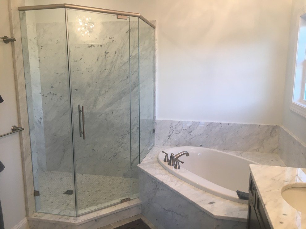 This is an example of a small beach style master bathroom in Other with shaker cabinets, black cabinets, a corner tub, a corner shower, white walls, an undermount sink, marble benchtops and ceramic floors.
