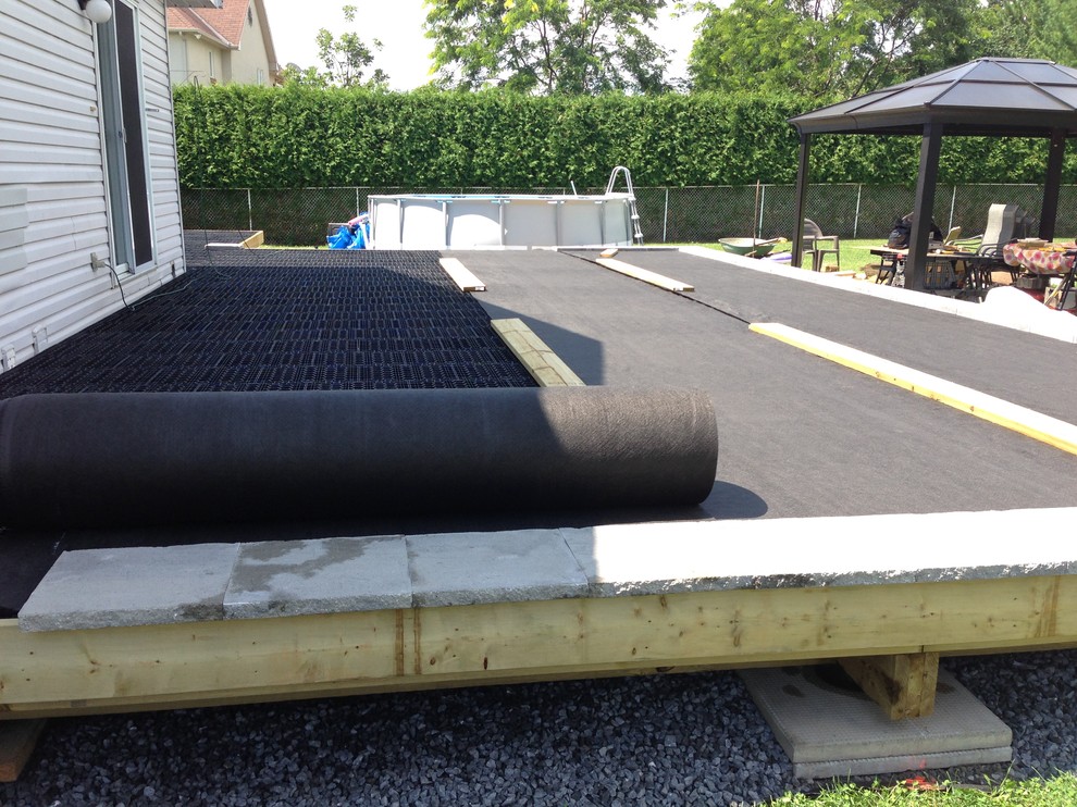 Example of a huge transitional backyard deck design