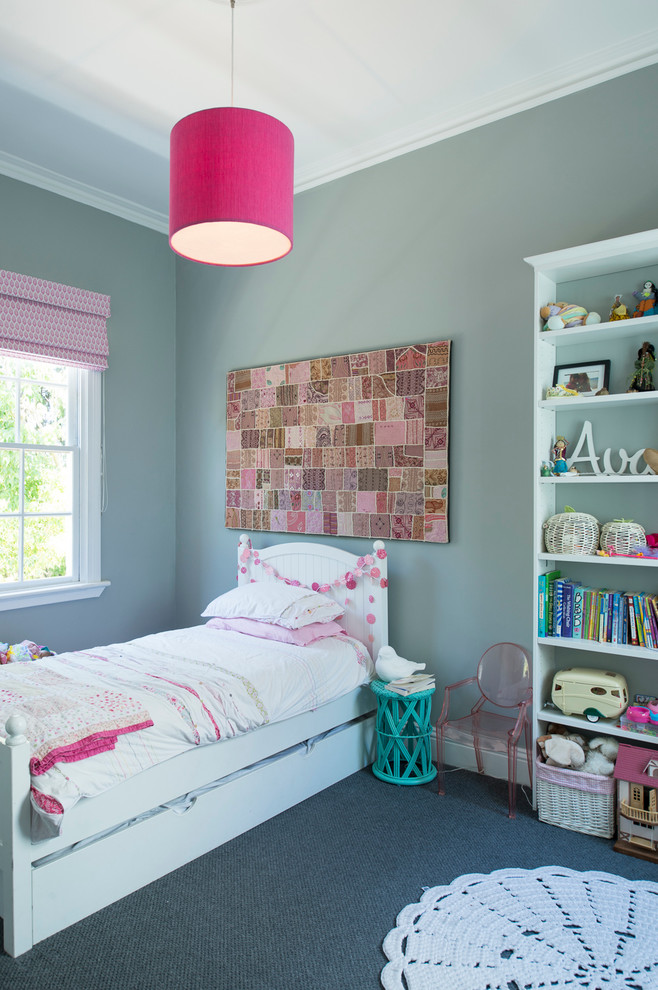 Inspiration for a small transitional kids' bedroom for kids 4-10 years old and girls in Melbourne with grey walls and carpet.