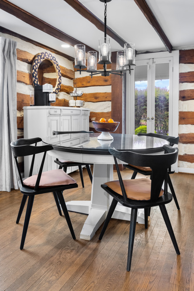 Dining room - traditional dark wood floor, brown floor, exposed beam and wood wall dining room idea in DC Metro with white walls
