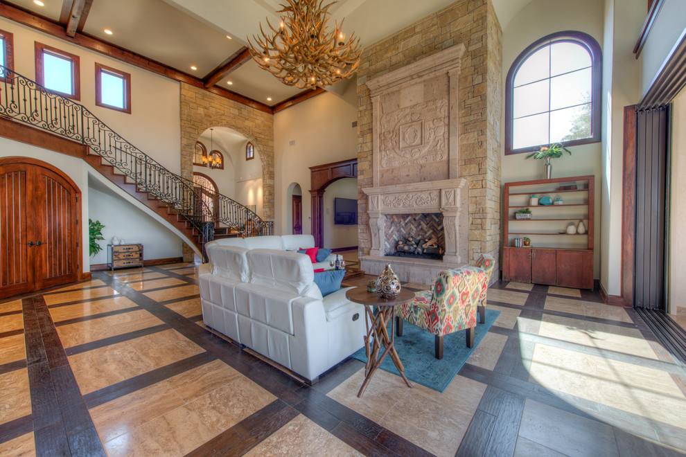 Inspiration for an expansive mediterranean formal open concept living room in Austin with a standard fireplace.