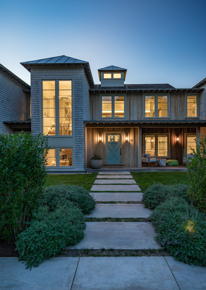 Photo of a beach style home design in Boston.