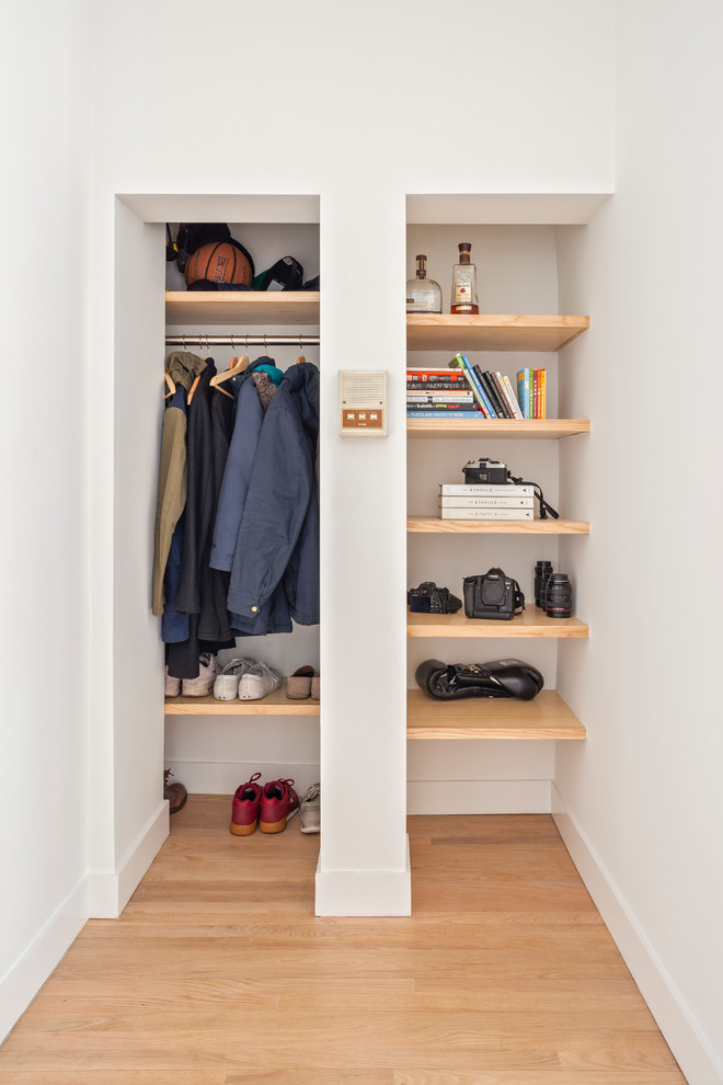 Design ideas for a scandinavian storage and wardrobe in New York.