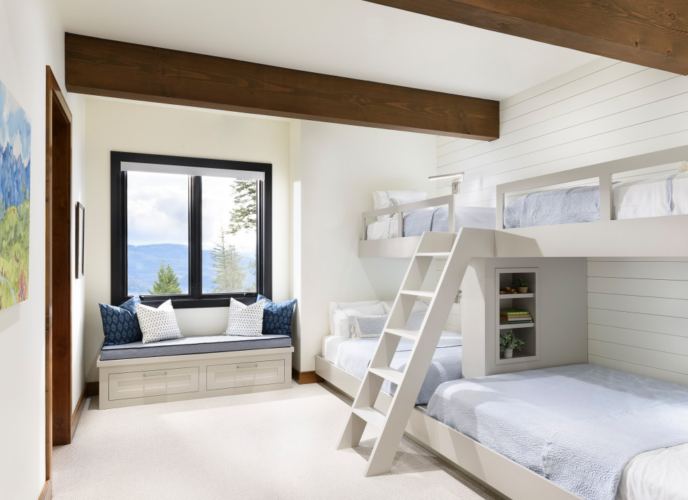 Design ideas for a country gender-neutral kids' bedroom for kids 4-10 years old in Other with white walls, white floor, exposed beam and planked wall panelling.