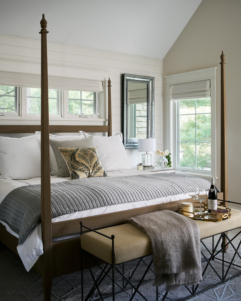 Inspiration for a transitional master bedroom in Chicago with white walls, vaulted and planked wall panelling.