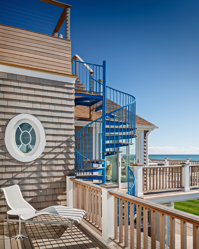 Photo of a large beach style deck in New York.