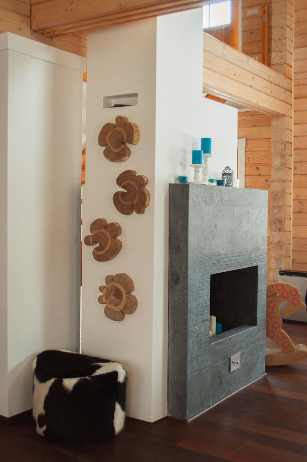 Камин был полностью переделан и облицован по эскизу талькомагнезитом